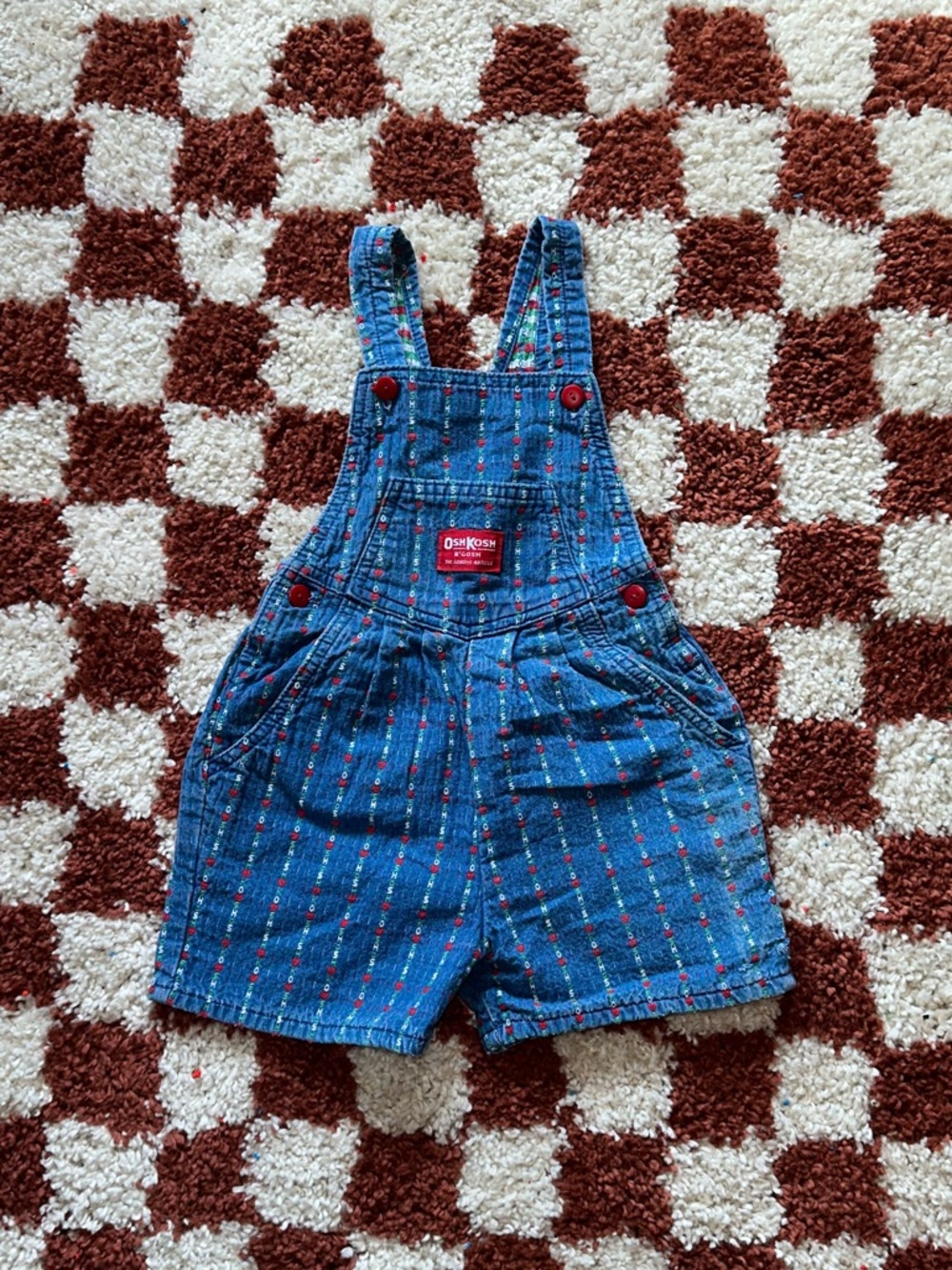 Vintage OshKosh B'gosh Blue Denim Shortalls with Red Button Accents